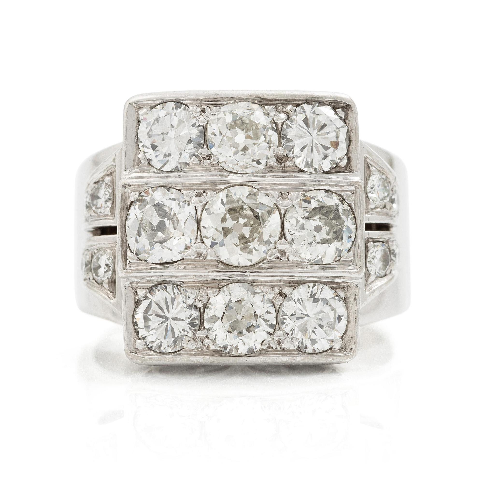 Ring 18K vitguld med runda briljant- och gammalslipade diamanter.