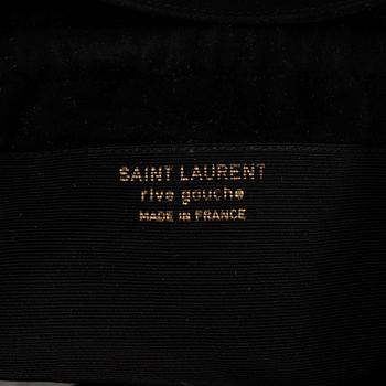 YVES SAINT LAURENT, a black suede bag.