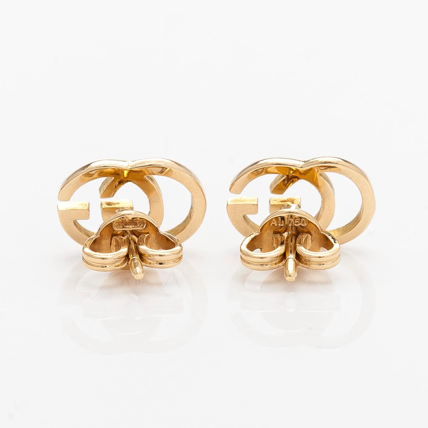 Gucci, a pair of 18K gold "GG Running" earrings.