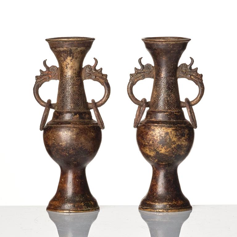 A pair of bronze altar vases, Ming dynasty (1368-1644).