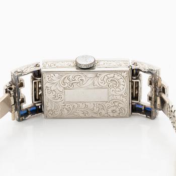 Ladies’ wristwatch in platinum and 18K white gold with old-cut diamonds and sapphires, Art Deco.