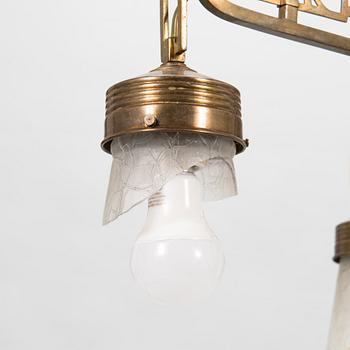 A Jugend style patinated bronze pendant ceiling light from the early 1900s.