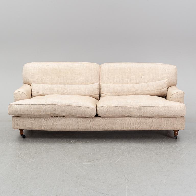 A 'Raffles' sofa designed by Vico Magistretti in 1988 for DePadova.