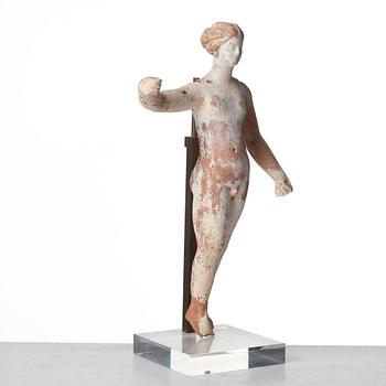 A Greek terracottta scultpure of Eros, Hellenistic period, Canosa, probably circa 3rd Century A.D.