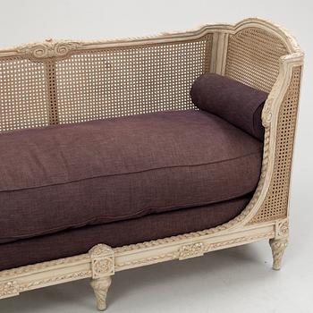 A Louix XVI-style sofa from Massant.