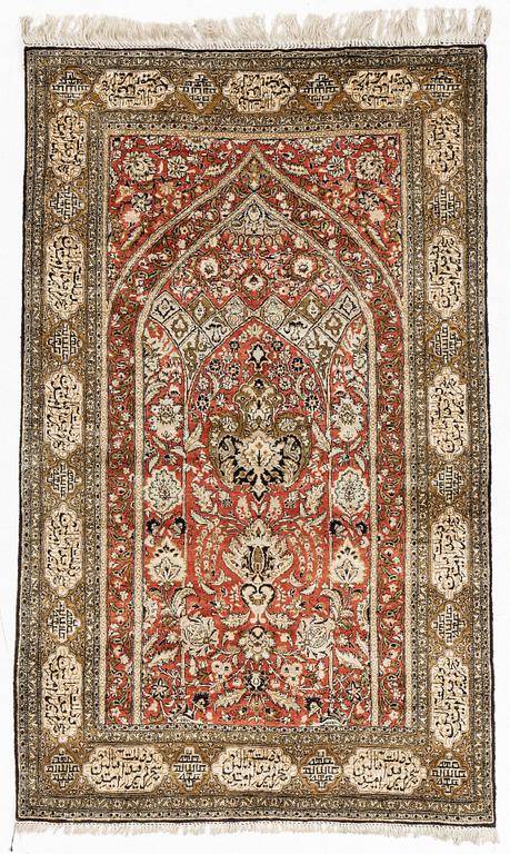 A rug, silk Quum, ca 174 x 103 cm.