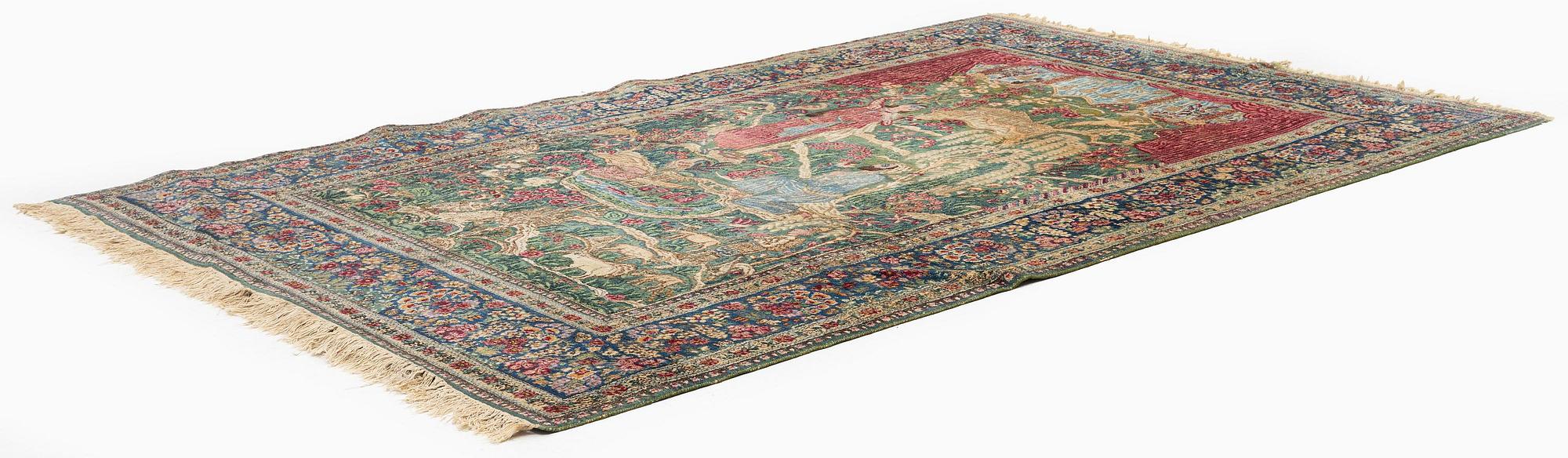 A semi-antique pictoral Kirman Lavar rug, Southeastern Persia (Iran), c. 236 x 156 cm.