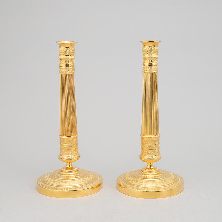 A pair of french Empire candlesticks, first half of the 19th Century.