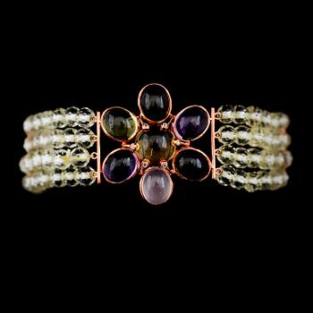 ARMBAND, silver förgyllt i roséguld, olikfärgade ädelstenar.