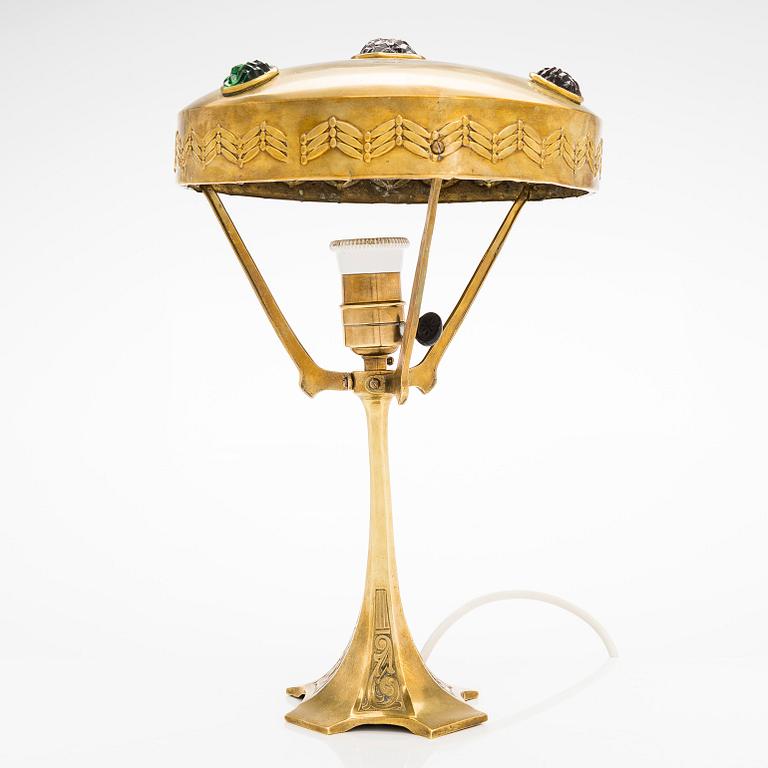 A brass table lamp, first half of the 20th century.