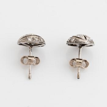 Brilliant cut diamond earrings.