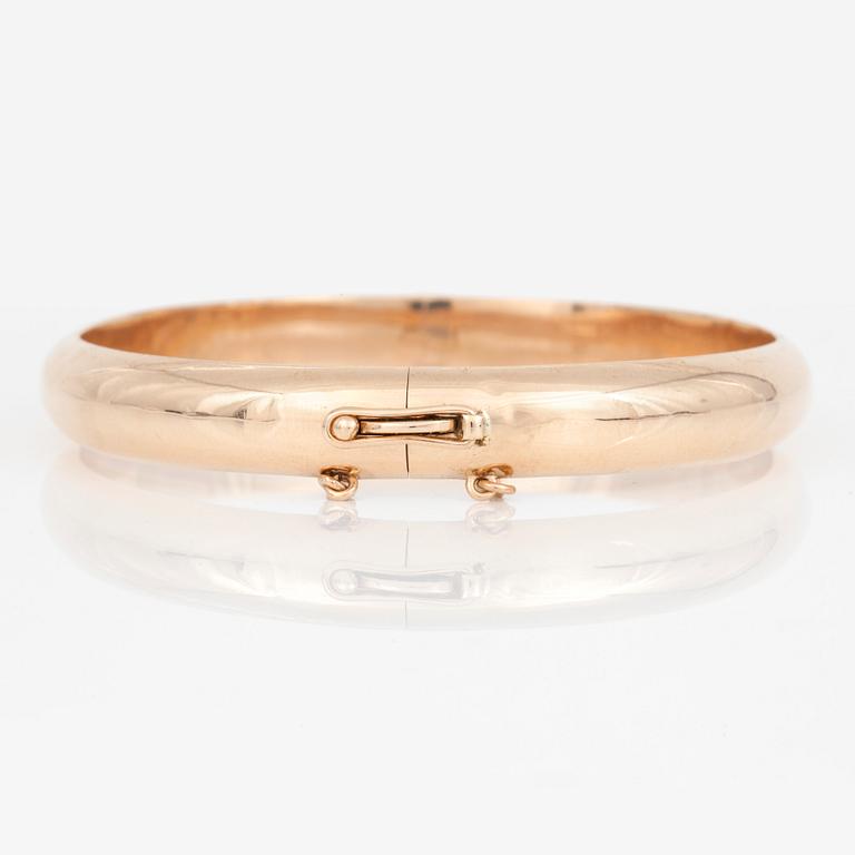 ARMRING, 14K guld.  Finland 1965. Total vikt 14,2 g.