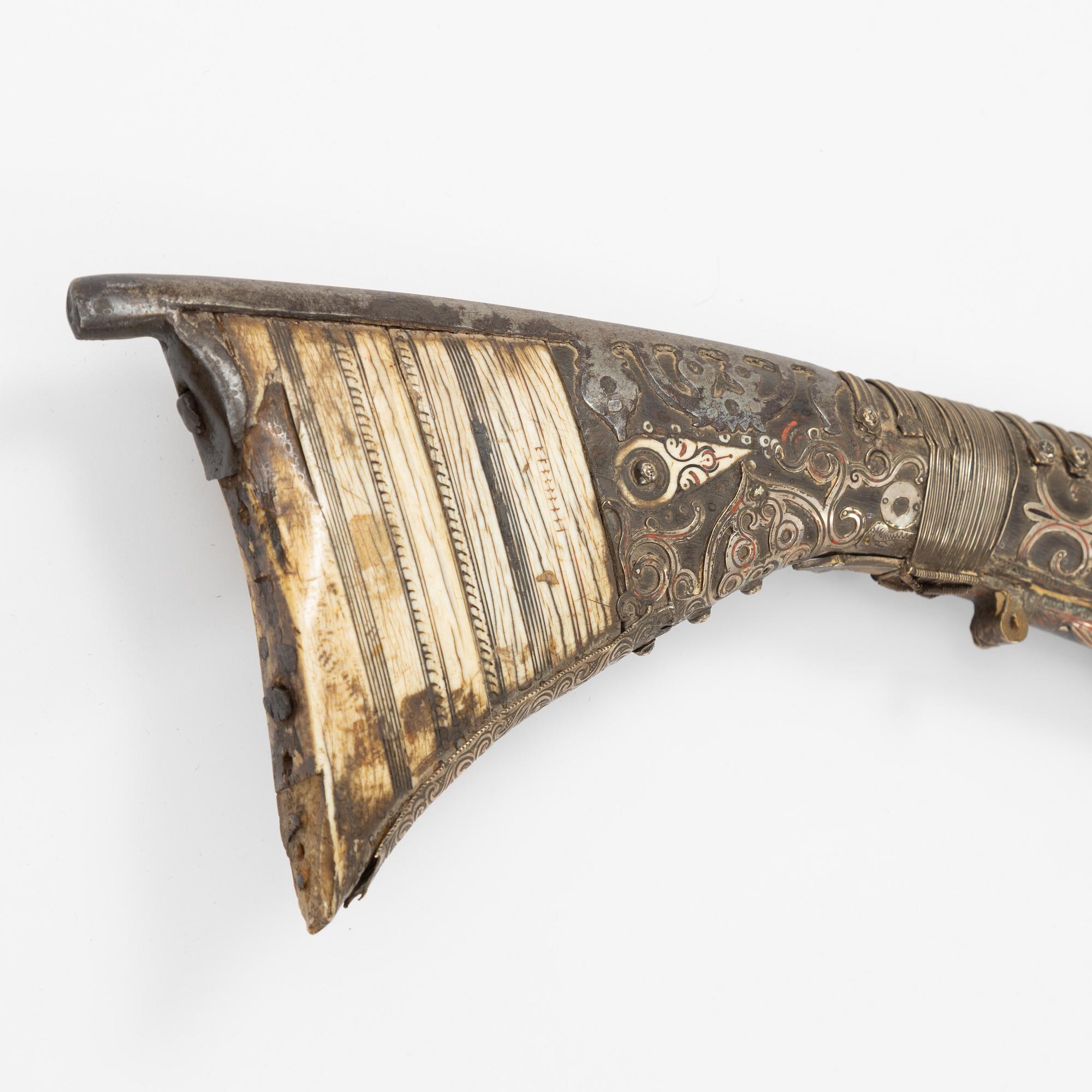 A snaphaunce gun, 19th Century.