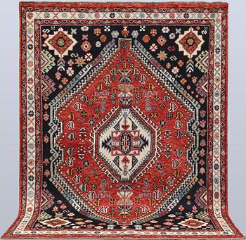 A Shirazi carpet, 237 x 173 cm.