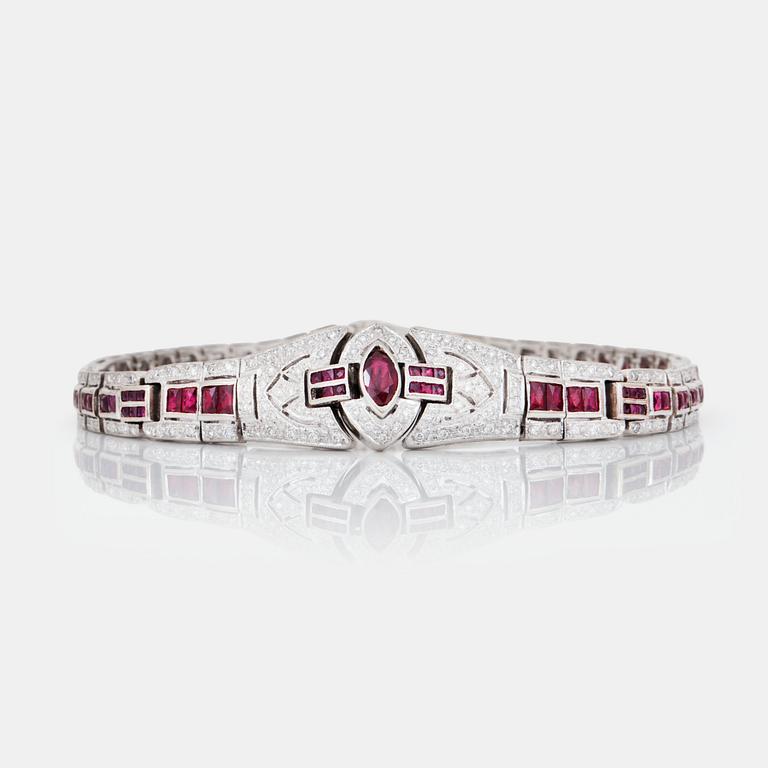 A brilliant-cut diamond and ruby bracelet.