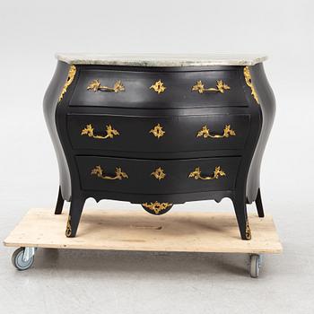 A Rococo style chest of drawers, mid 20th Century.