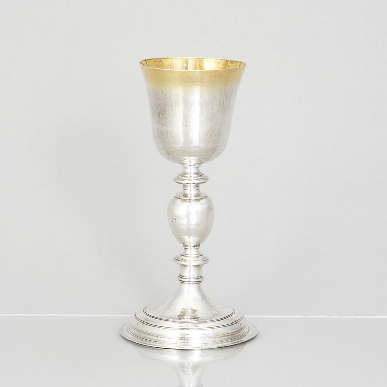 An 18th century parcel-gilt silver cup, makers mark A.M, probably Germany.