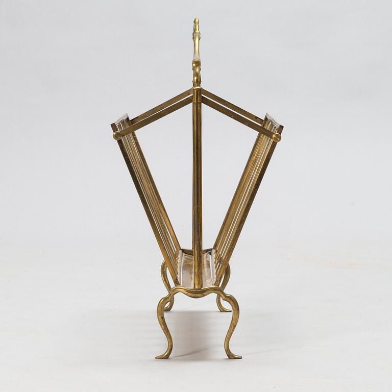 A folding brass magazine stand, first half of the 20th century.