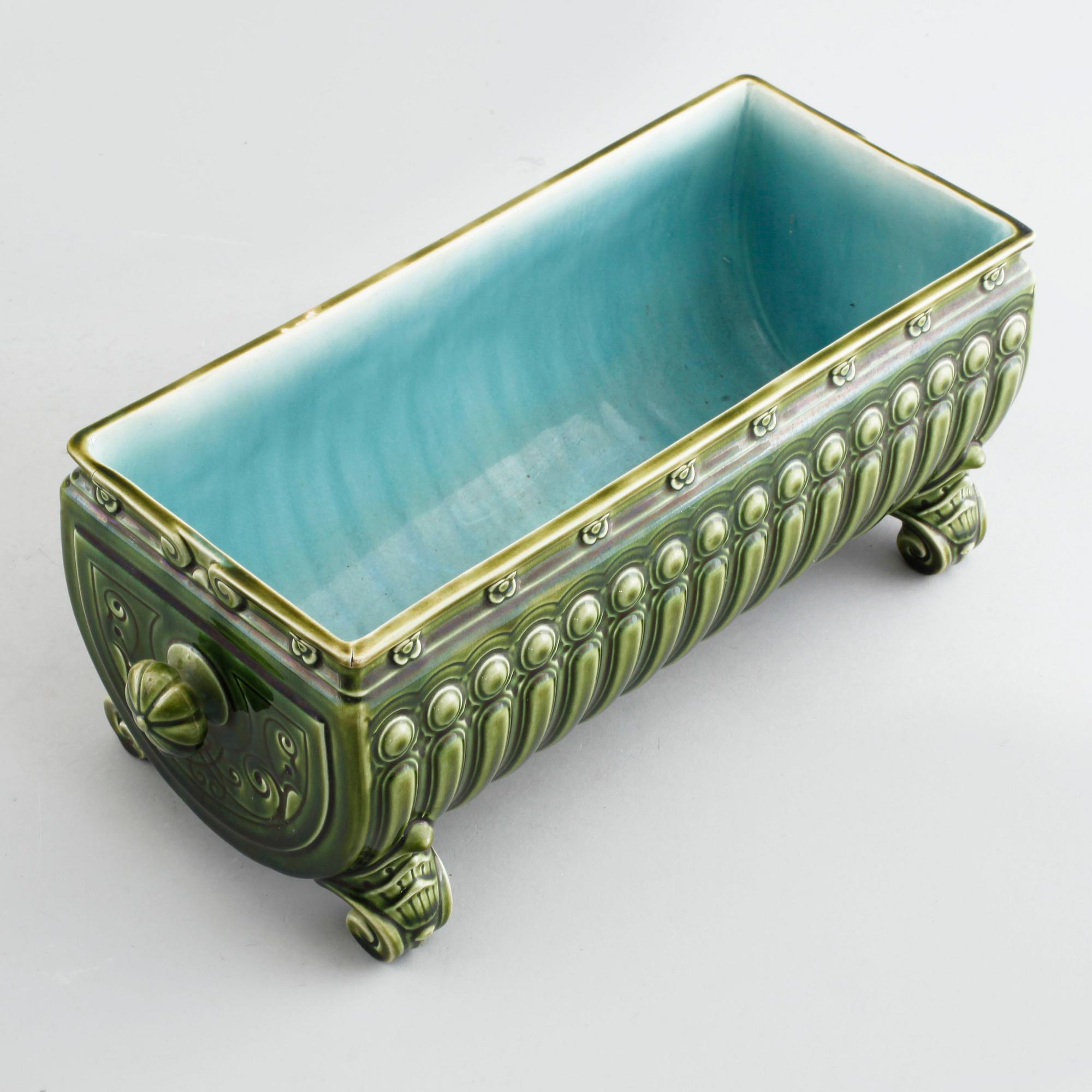 A vase and a flower pot from aorund year 1900.