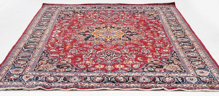 A carpet, Oriental, c. 335 x 257 cm.