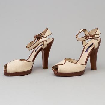 High heeled sandals by Ralph Lauren.