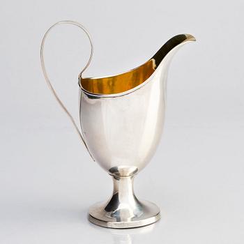 A Swedish parcel-gilt silver cream-jug, mark of Gustaf Hagström, Stockholm 1807.