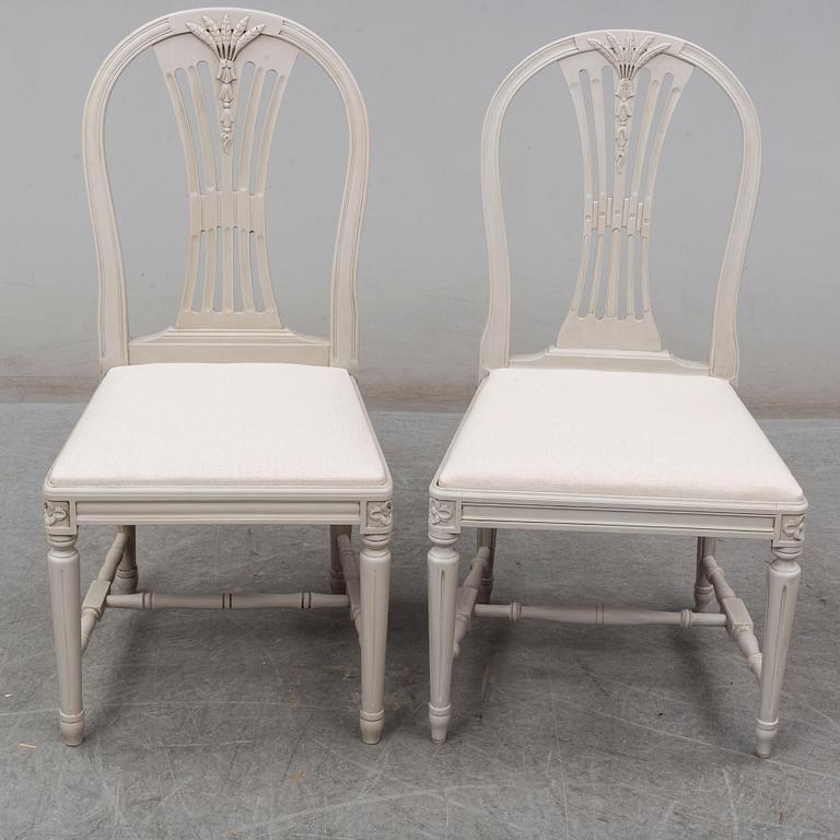 a set of 4+4 gustavian style chairs from the second half of the 20th century.