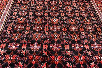 A Borujerd carpet, c. 300 x 225 cm.