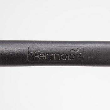 A 'Luxembourg' lounge chair and a foot stool, Fermob.