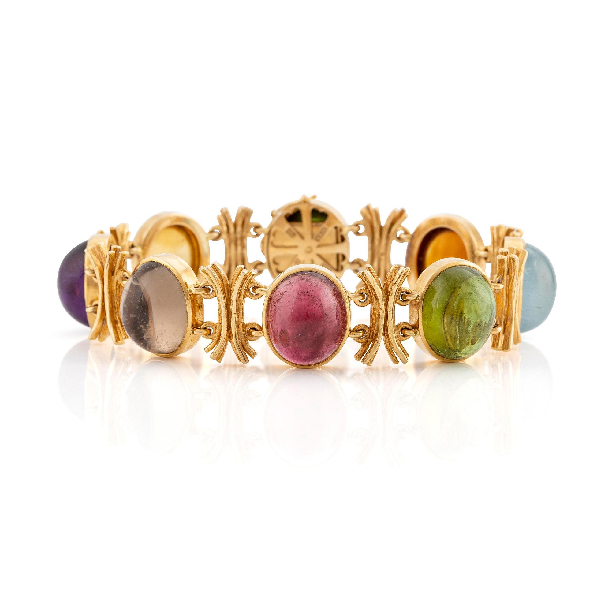 W.A. Bolin, design Barbro Littmarck, armband, 18K guld med cabochonslipade färgstenar, Stockholm 1970.