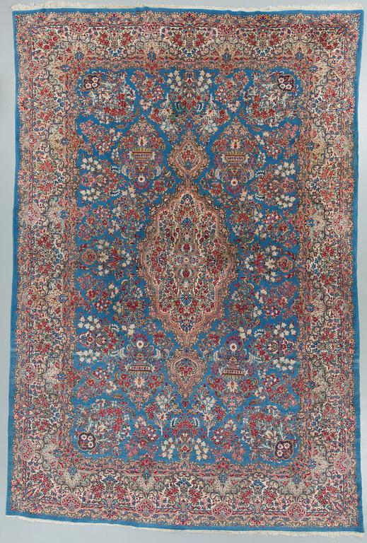 A semi-antique Kerman carpet,  440 x 296 cm.