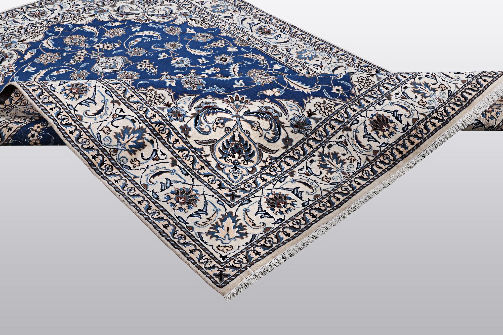 A carpet, Nain, part silk 9 LAA, ca 310 x 203 cm.