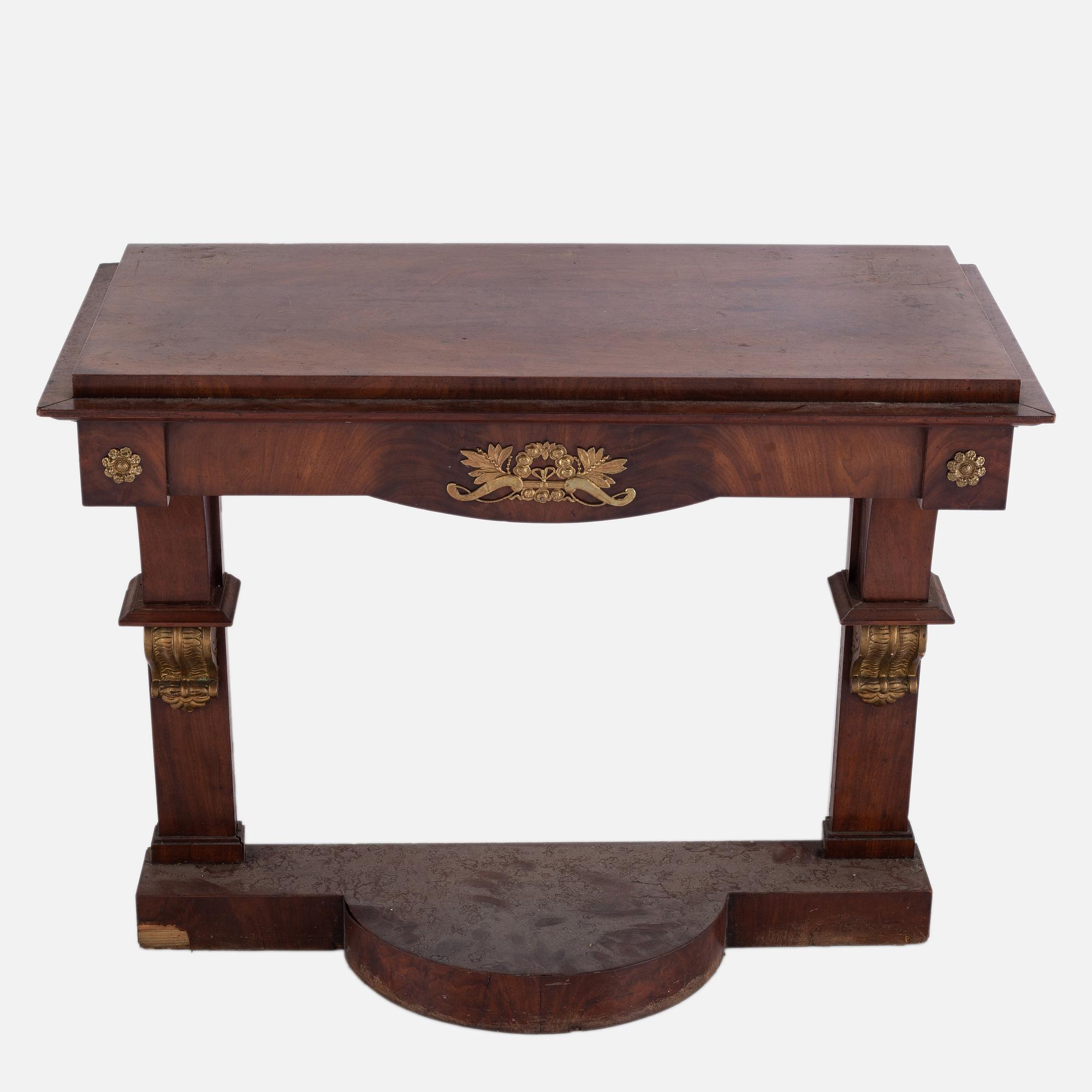 A Swedish Empire mirror and console table, first half of the 19th century.