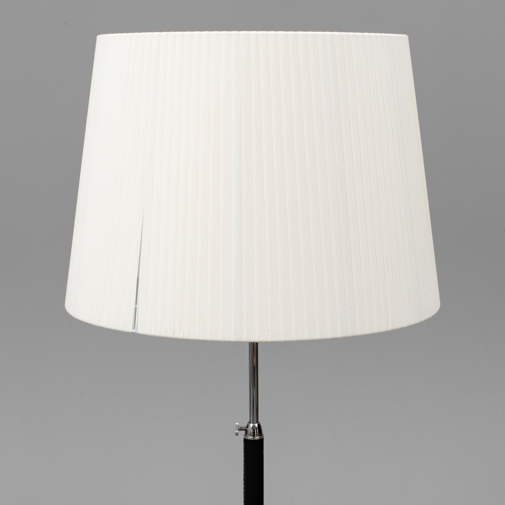 Three contemporary floorlamps by Santa & Cole.