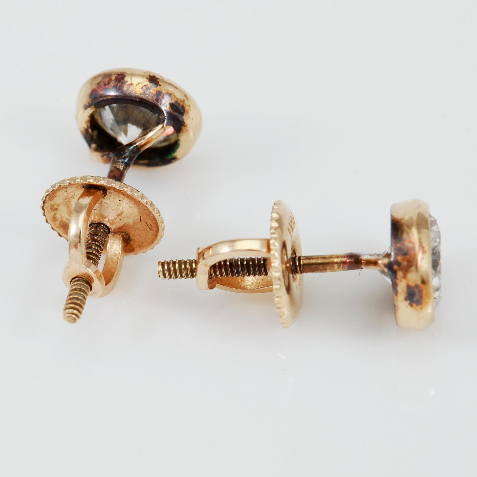 ÖRHÄNGEN, 1 par, solitära briljantslipade diamanter totalt ca 1,30 ct.