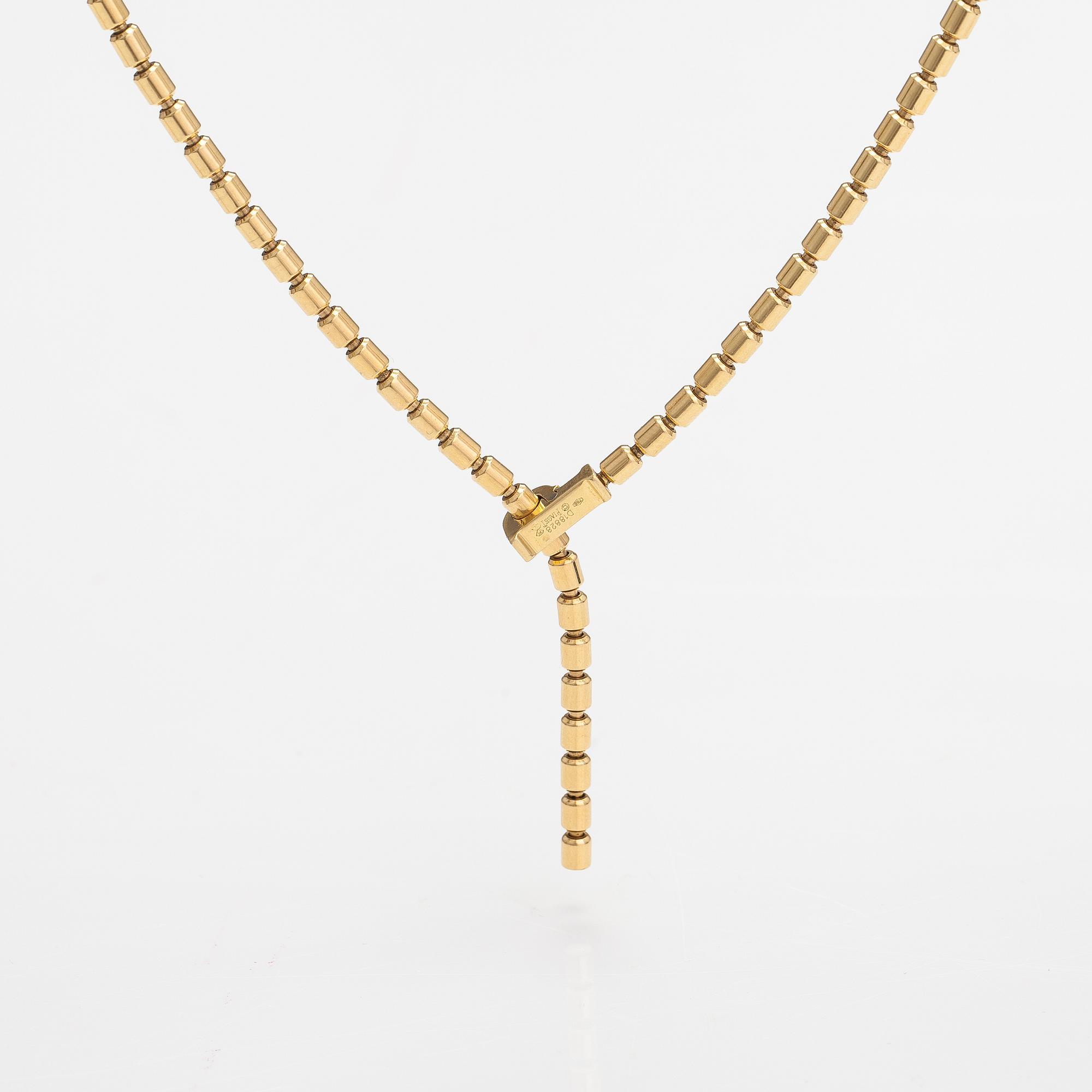 Piaget, An 18K gold "Possession" necklace with diamonds ca. 0.17 ct in total. Marked Piaget D18828.