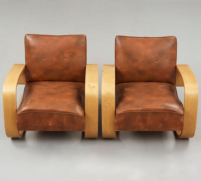 Alvar Aalto, a pair of 'tank chairs' model 400, Huonekalu-ja Rakennustyötehdas Oy for Artek, Finland 1940's-50's.