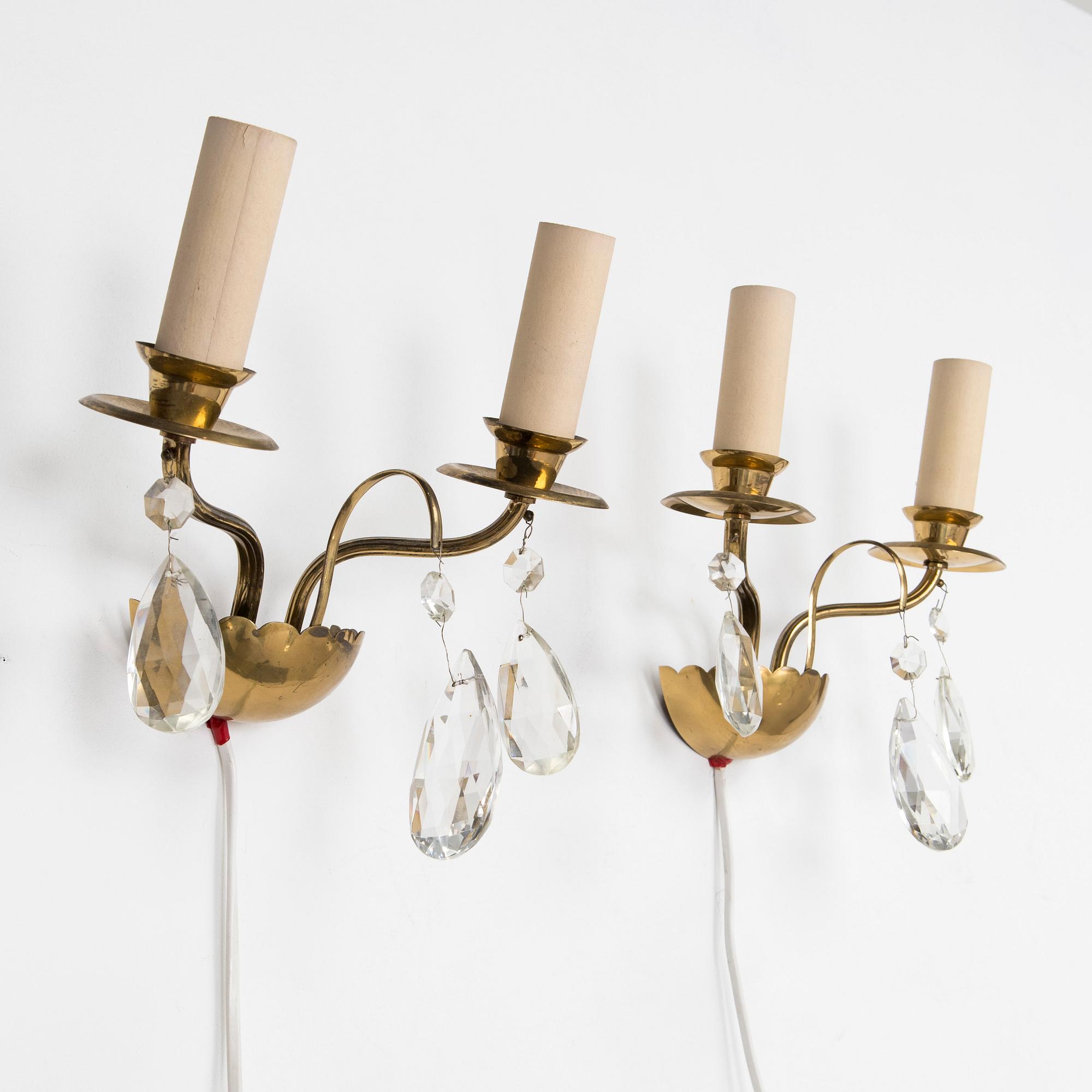 Four of mid-20th century wall sconces.