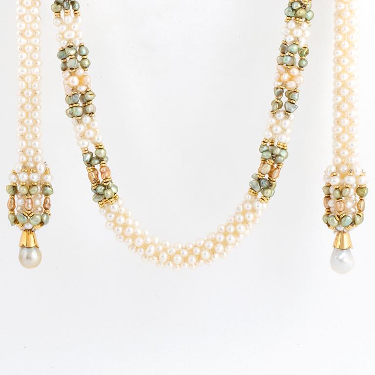 Green and white seed pearl with baroque shaped cultured pearl necklace.