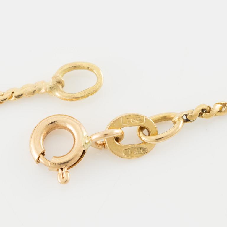 Pendant in 18K gold with a round brilliant-cut diamond.