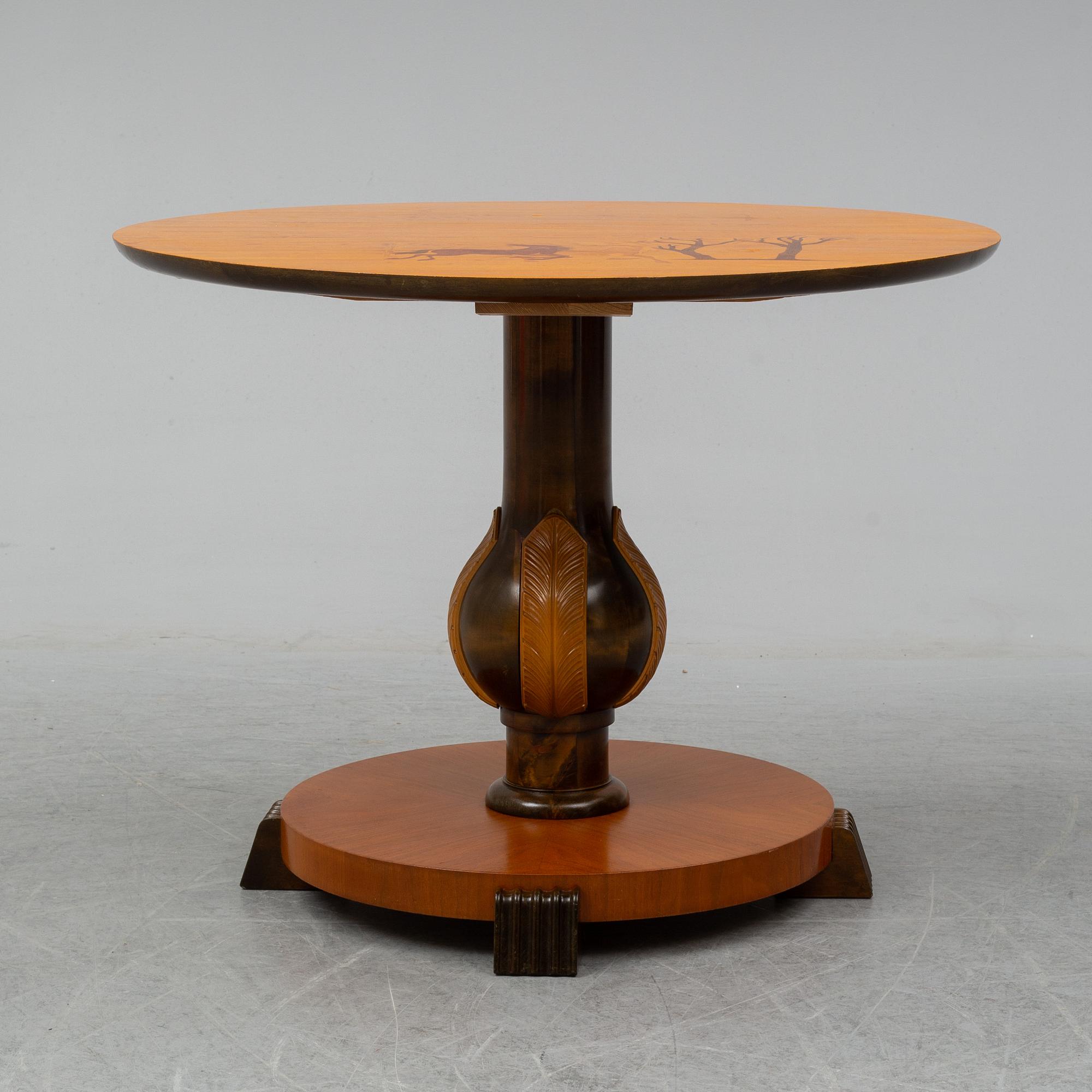 a 1930's-/40's table by Mjölby Intarsia.