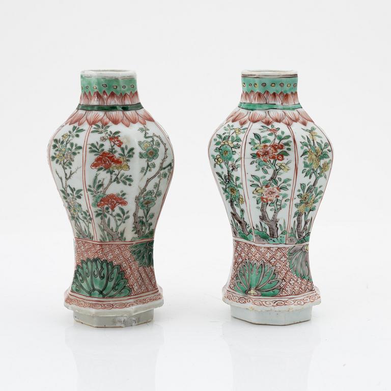 A matched pair of famille verte vases, Qing dynasty, 18th Century.