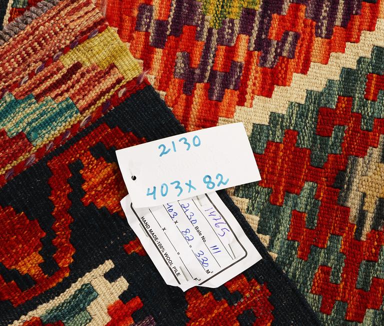 A Kilim runner, Afghanistan, a. 403 x 82 cm.