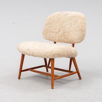 A TeVe easy chair by Alf Svensson, with new sheepskin upholstery, Studio Ljungs Industrier, 1950's.