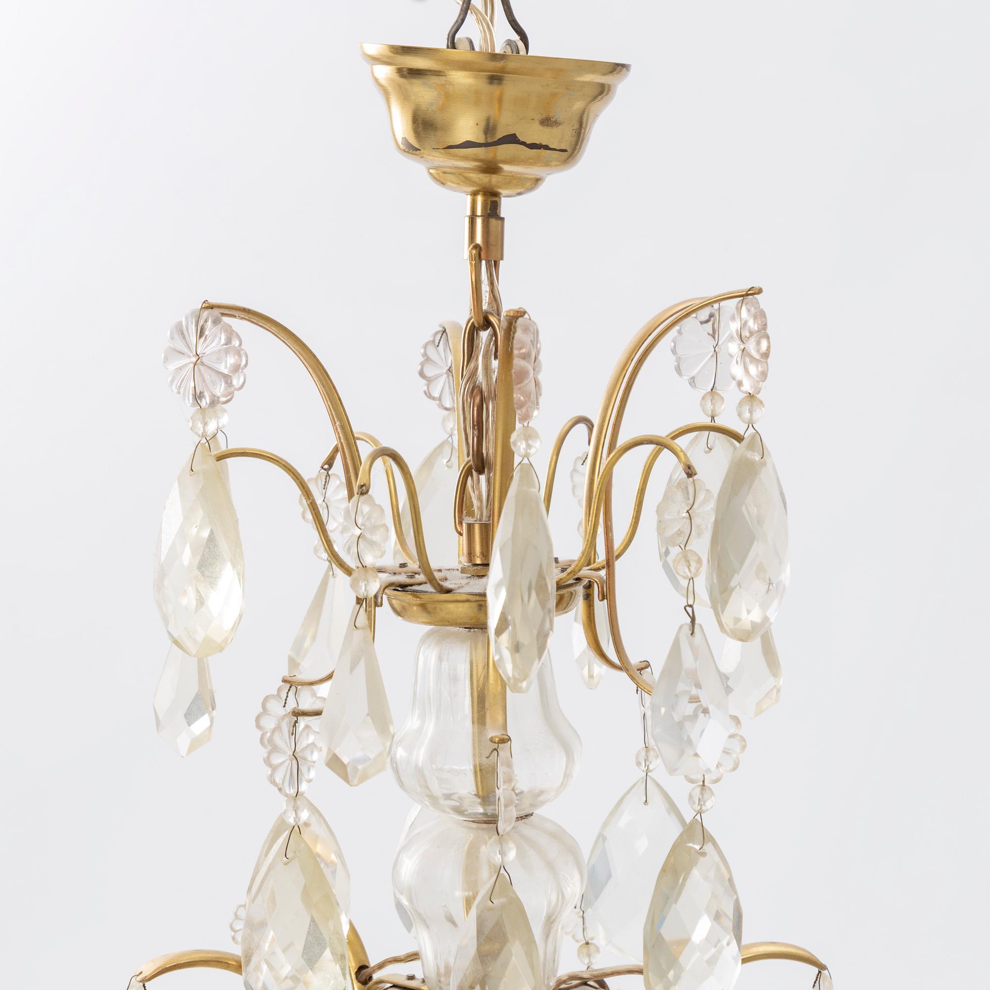 A Rococo style chandelier, Sweden, 20th Century.