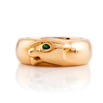 537. An 18K gold Cartier ring set with a tsavorite.