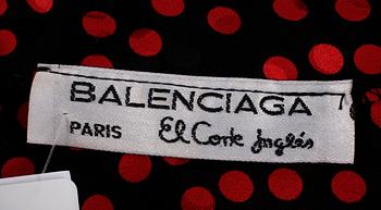 A silk dress by Balenciaga.