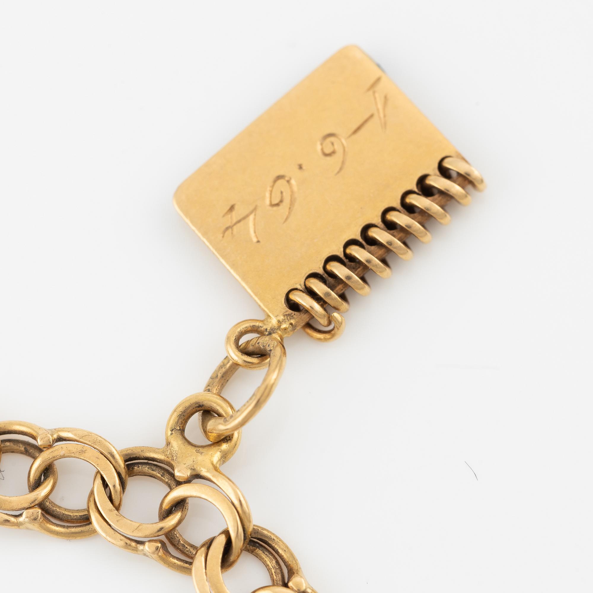 Armband, 18K guld, med berlocker.