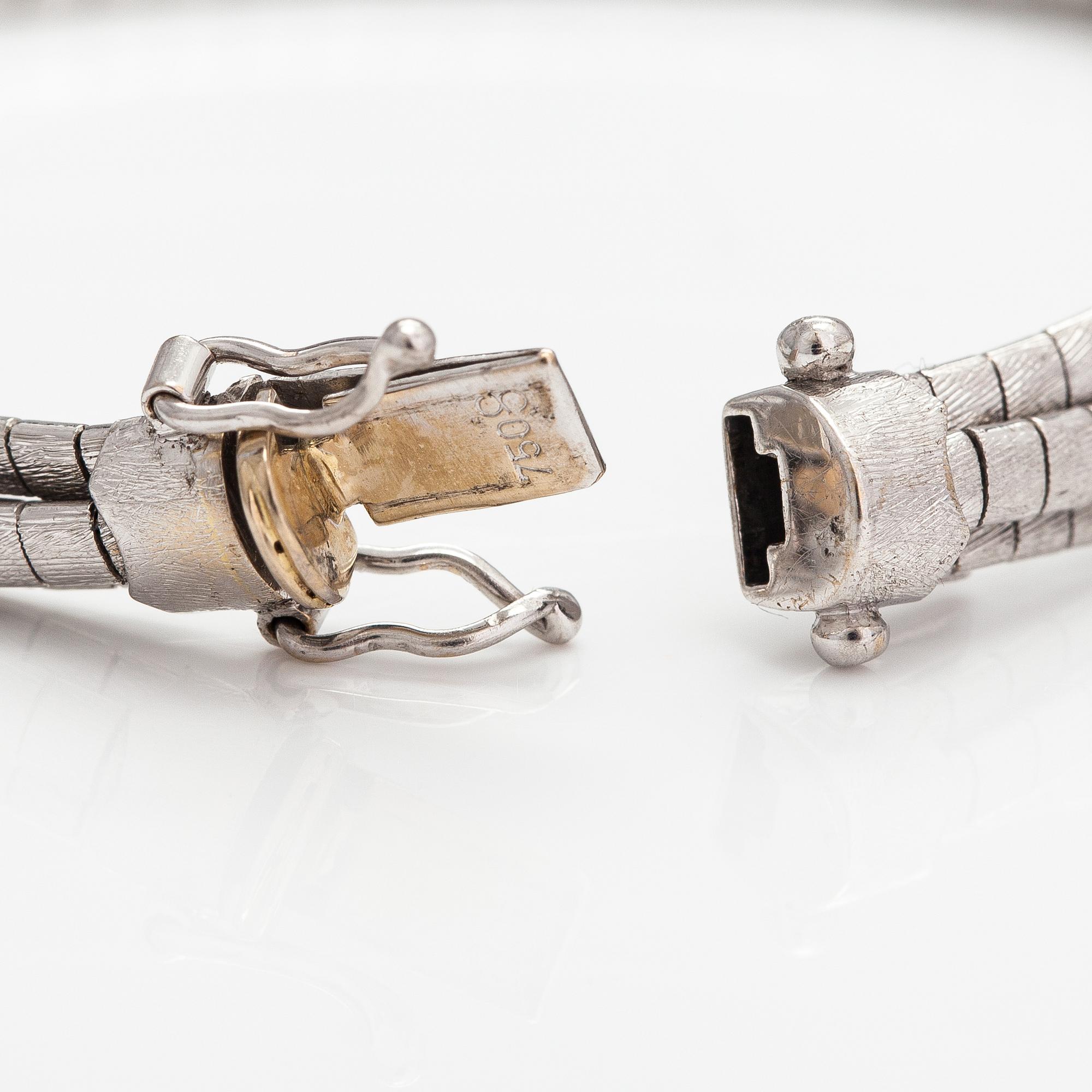 A 14K white gold bracelet. Import marked TIllander, Helsinki 1967.