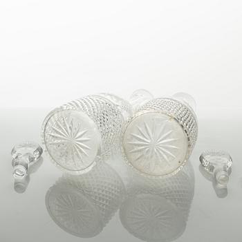 Two glass decanters, around the year 1900.